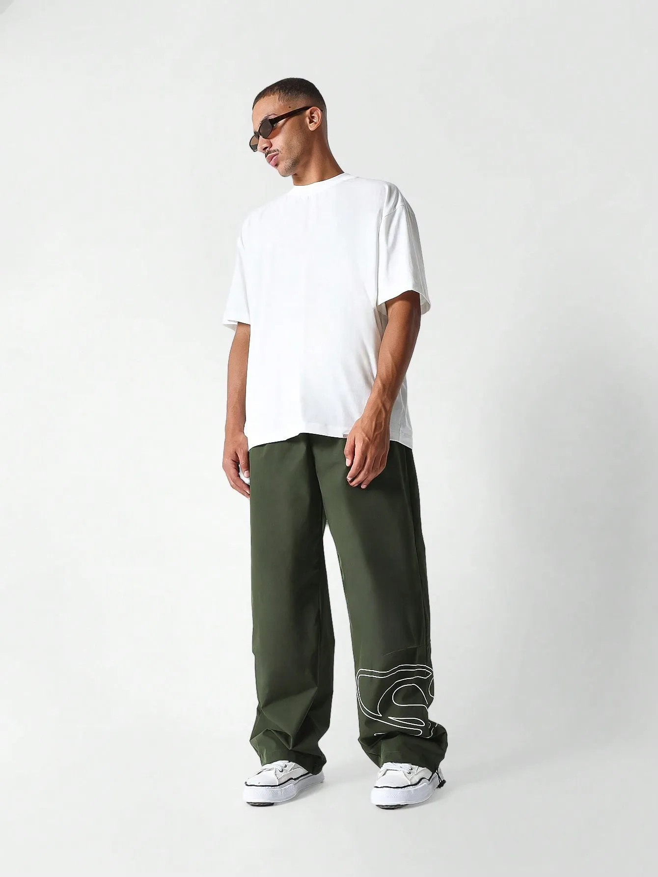 Loose Fit Baggy Nylon Parachute Pant With Graphic Print