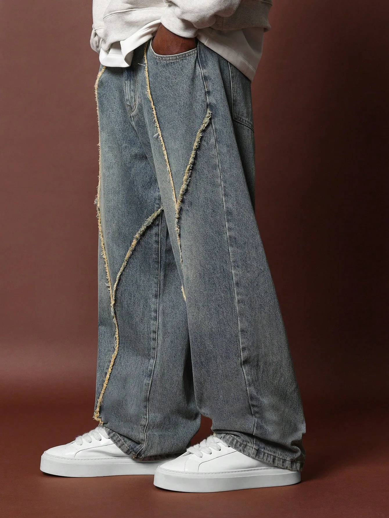 Loose Fit Dirty Wash Jean With Raw Edge Seam Details