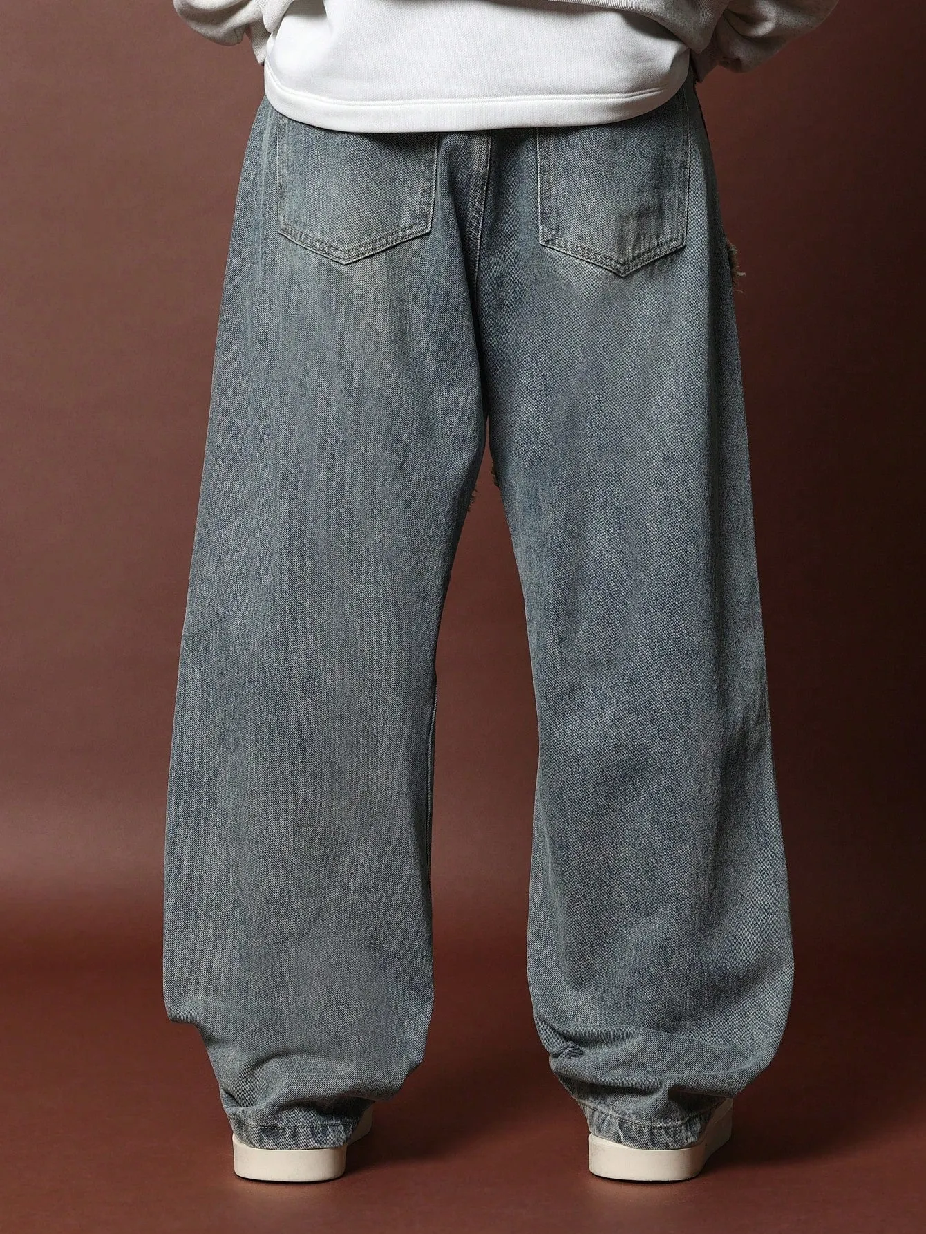 Loose Fit Dirty Wash Jean With Raw Edge Seam Details